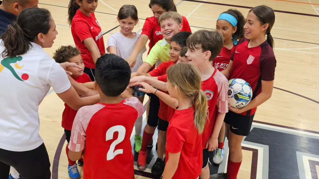 Team going in for a huddle